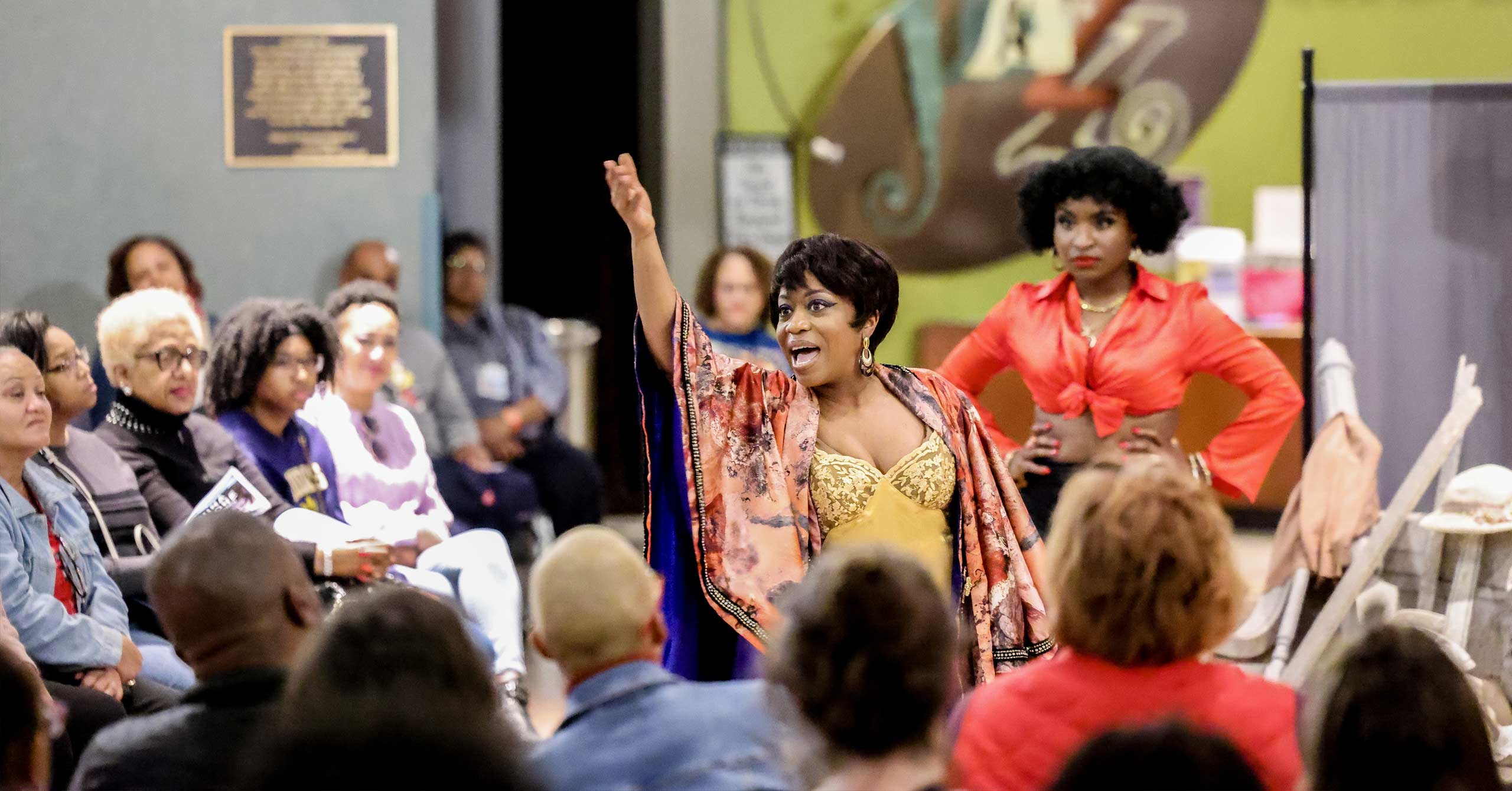 Alexis J. Roston as Nina Simone performs for a packed room of patrons in the lobby of the American Jazz Museum